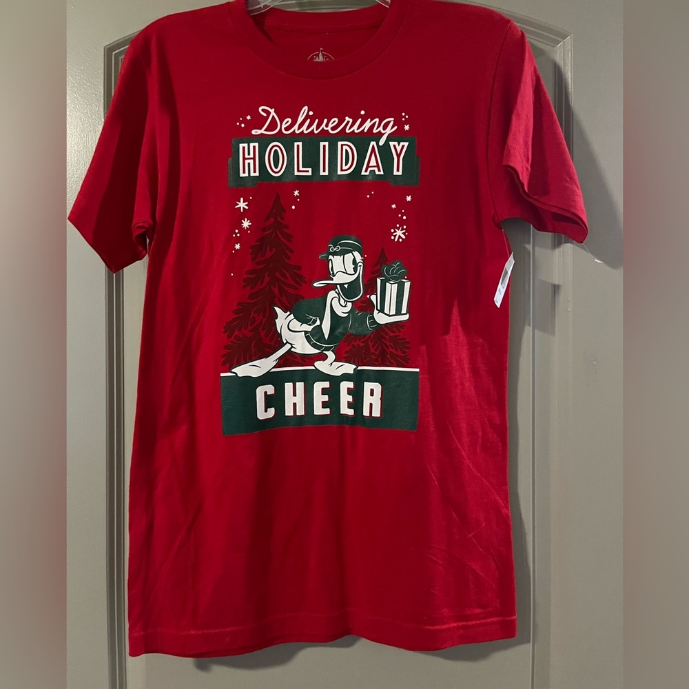 Donald Duck “delivering holiday cheer” Disney parks shirt